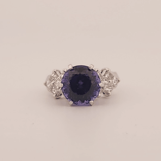 Natural Round Modified Brilliant Cut, Bluish Violet Tanzanite (5.25 CT - 10.20 mm) with 12 Natural Princess cut 3x3 mm Square Diamonds (1.92 CTW) Ring 14K White Gold. GIA Certified (2231466864).