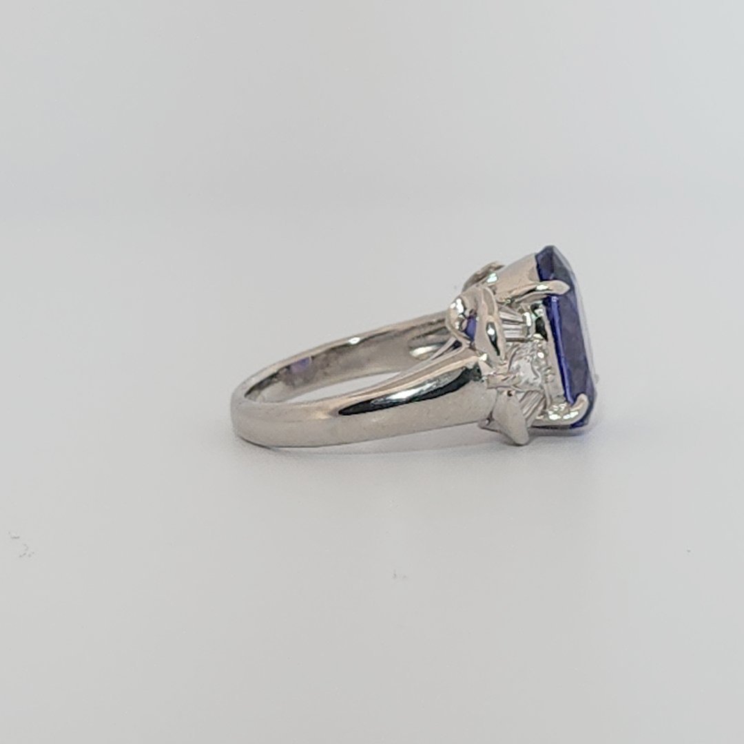 Modified Brilliant Cut, Oval Shape, Bluish Violet Tanzanite (4.38CT, 12.77 x 8.29 x 5.57 mm), Mounted at Platinum 900 Ring with Natural Diamonds (0.60 CTW, E/F-VS). GIA Certified (5232466621). Size 5.75