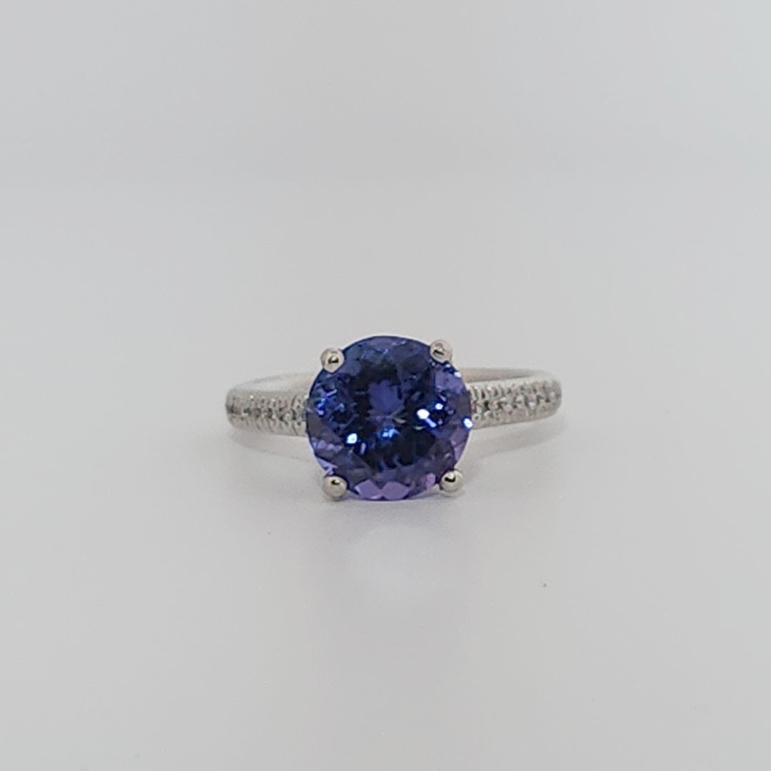 Modified Brilliant Cut, Round Shape, Bluish Violet Tanzanite (2.80CT, 8.89 - 9.01 x 5.53 mm), Mounted at Platinum 950 ring with Natural Diamonds (0.18 CTW E/F-SI). GIA Certified (5231466569). Size 5.25