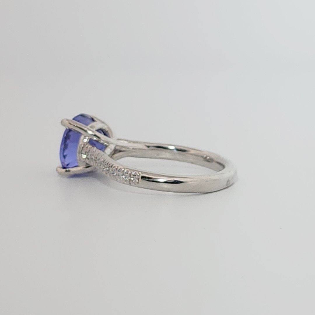 Modified Brilliant Cut, Round Shape, Bluish Violet Tanzanite (2.80CT, 8.89 - 9.01 x 5.53 mm), Mounted at Platinum 950 ring with Natural Diamonds (0.18 CTW E/F-SI). GIA Certified (5231466569). Size 5.25