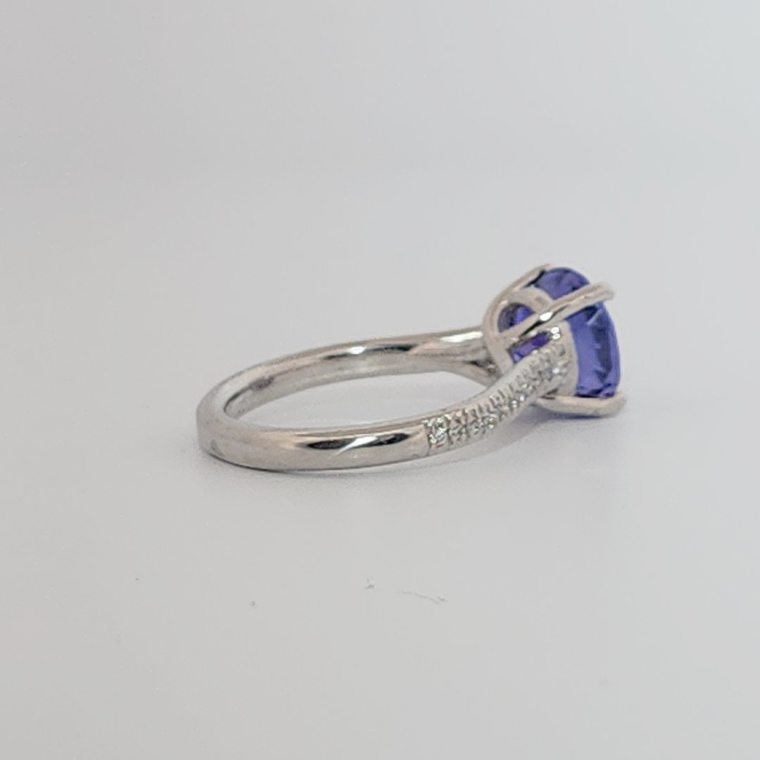Modified Brilliant Cut, Round Shape, Bluish Violet Tanzanite (2.80CT, 8.89 - 9.01 x 5.53 mm), Mounted at Platinum 950 ring with Natural Diamonds (0.18 CTW E/F-SI). GIA Certified (5231466569). Size 5.25