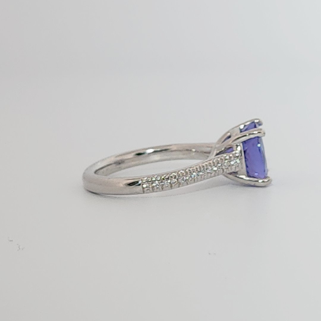 Modified Brilliant Cut, Round Shape, Bluish Violet Tanzanite (2.80CT, 8.89 - 9.01 x 5.53 mm), Mounted at Platinum 950 ring with Natural Diamonds (0.18 CTW E/F-SI). GIA Certified (5231466569). Size 5.25
