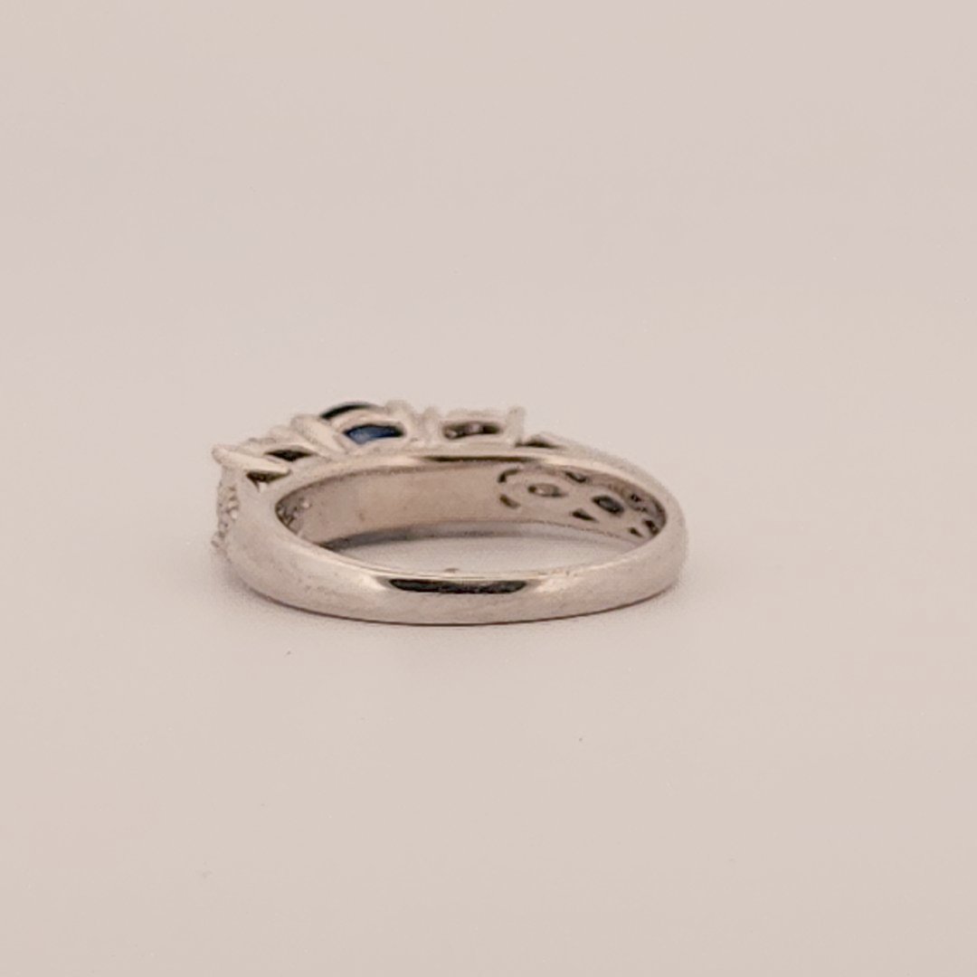 Three stone style Bridal Ring with 0.75 CT Natural Sapphire and 0.34CTW Natural Diamonds