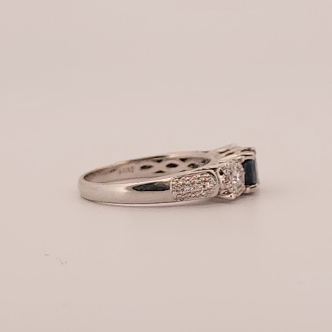 Three stone style Bridal Ring with 0.75 CT Natural Sapphire and 0.34CTW Natural Diamonds