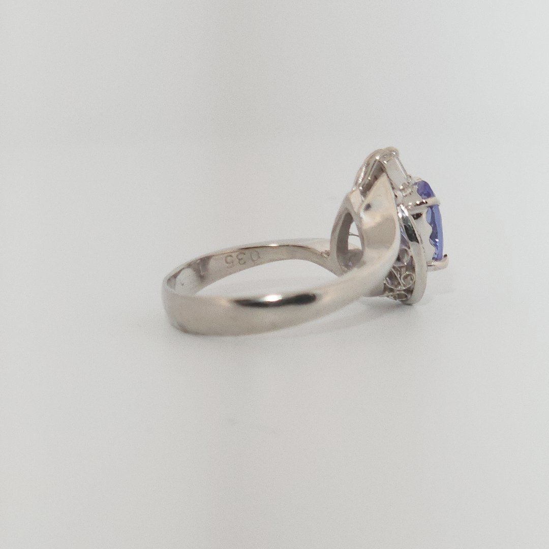 Oval Faceted, AAA, Natural Tanzanite (1.15CT, 8x6mm), Mounted on Platinum 900 Ring with Natural Diamonds (0.35 CTW, E/F-VS). Size 6