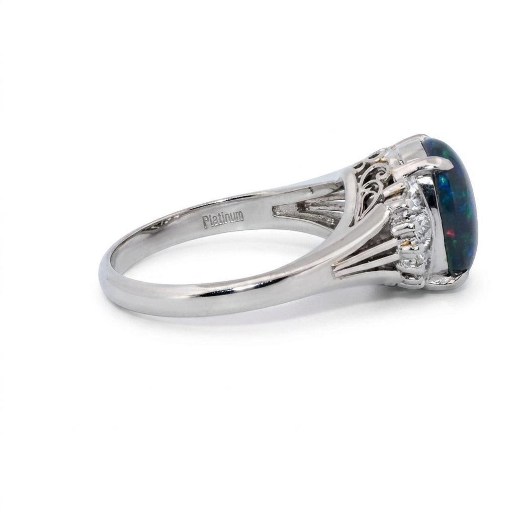 DATA_MISMATCH: Black Opal Ring vs Opal 2.6ct (typical white/translucent) | Platinum Ring, set with 1 Opal (2.6ct, dark/black) and Diamonds (0.485ct total), 8g